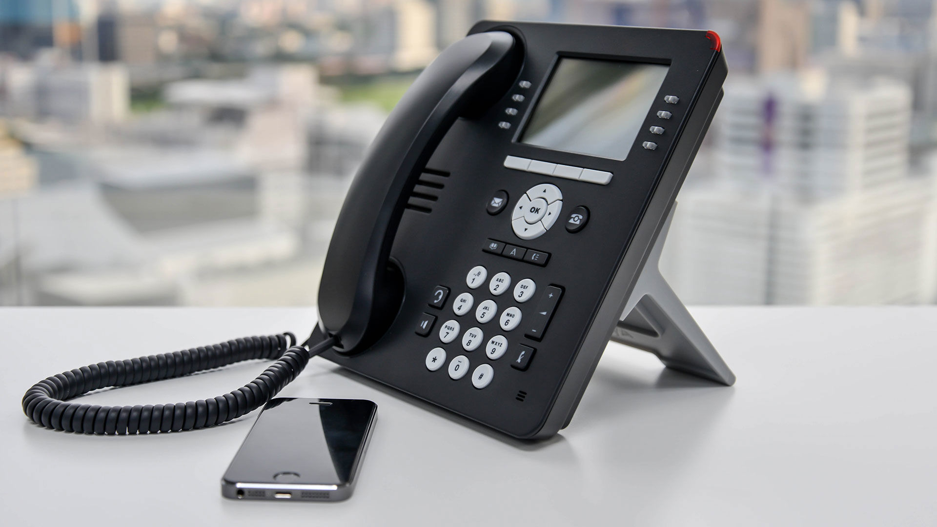 Mobil og trykknap telefon