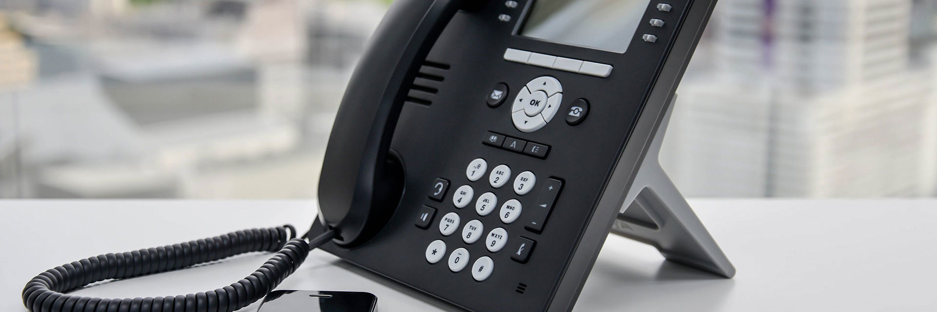 Mobil og trykknap telefon