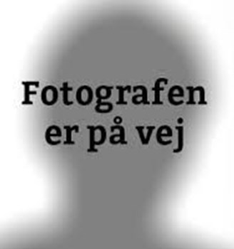 Siluet med ordlyden 'Fotografen er på vej'